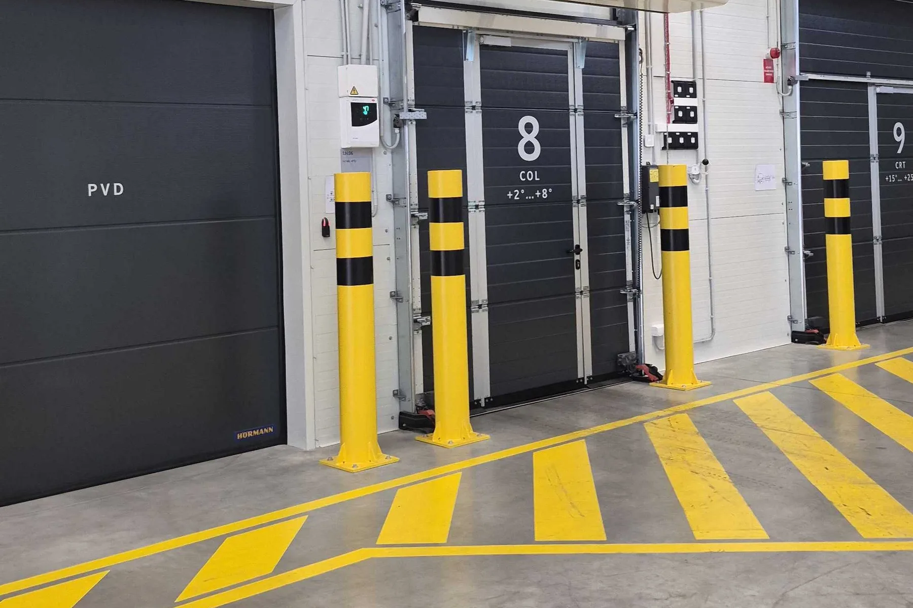 Numbered loading dock doors at the airBaltic Cargo hub