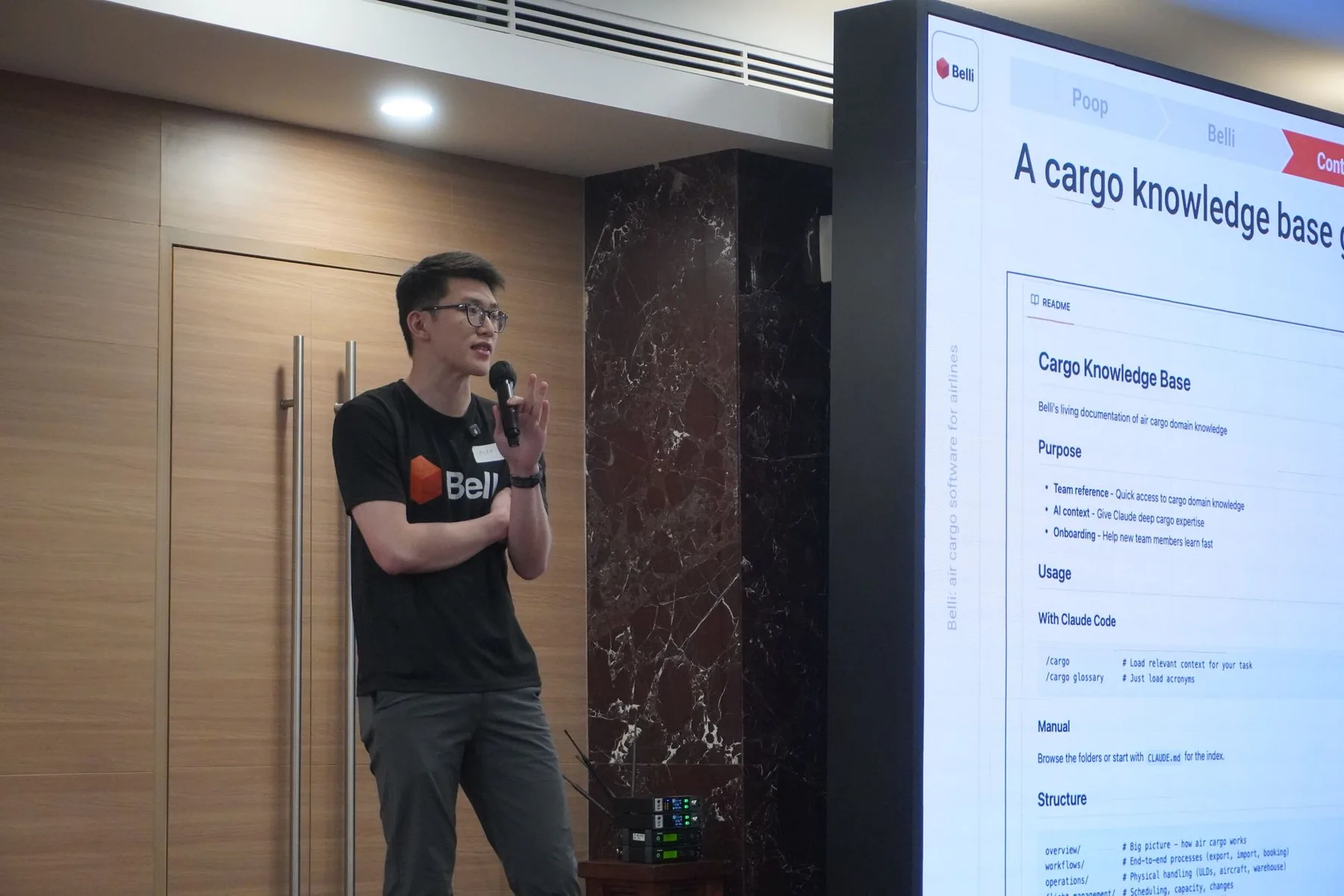 Belli co-founder Alex Khor presenting Belli's cargo knowledge base at the Jakarta AI meetup