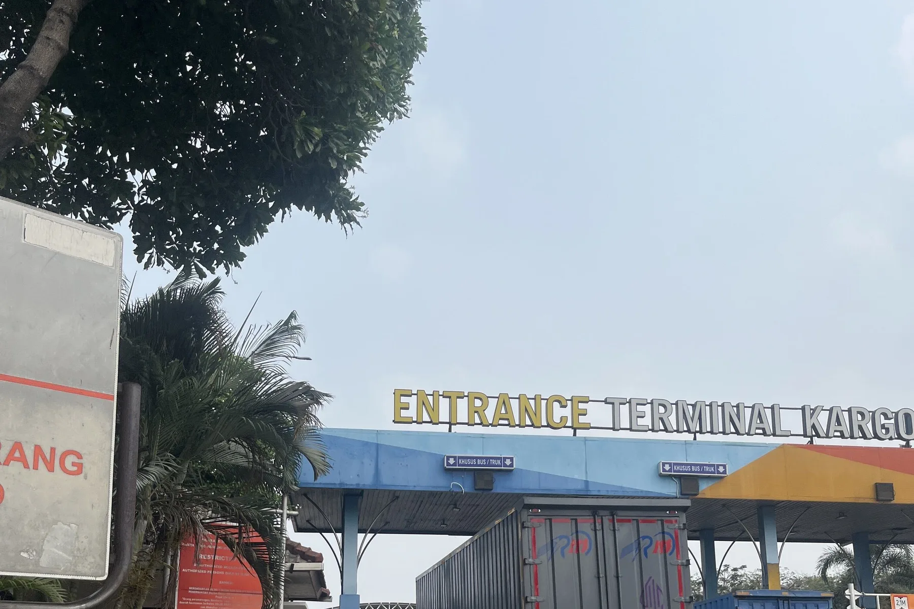 Trucks queuing at the cargo terminal entrance gate